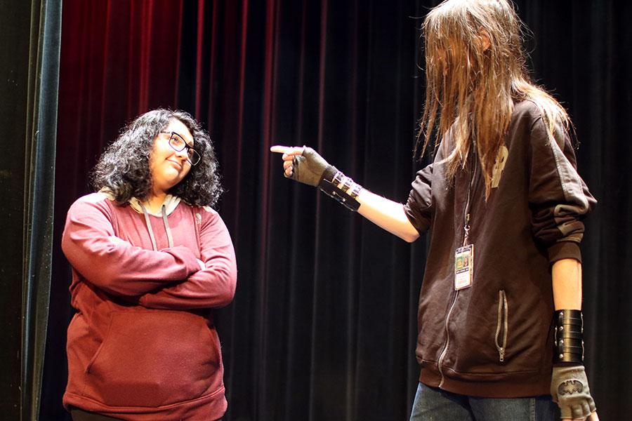 Junior Celeste Castro (left) and senior Raymond Taylor (right) act out an excerpt from Drama Club’s upcoming play “Crumpled Classics” in their sixth period Acting class.