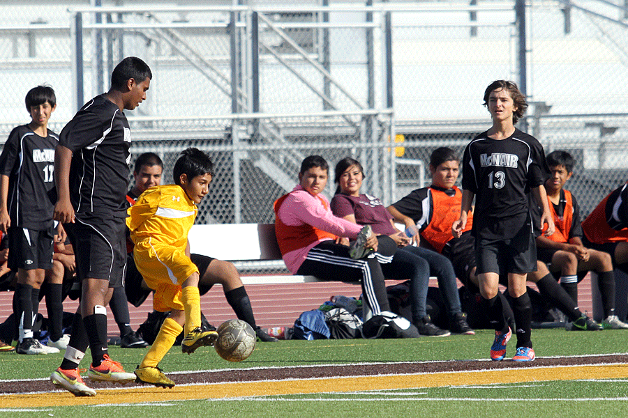 Freshman Eduardo Vasquez steals a pass from a McNair player during a game on October 1rst. The JV team went on to lose 2-0. 