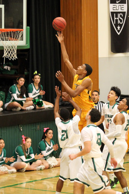 Sophomore Kenneth Wooten goes up for the shot against St. Marys. The team went on to lose. 