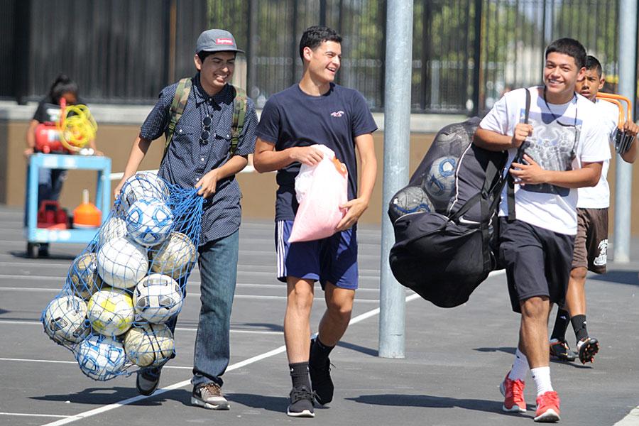 Students prepare for soccer practice. 