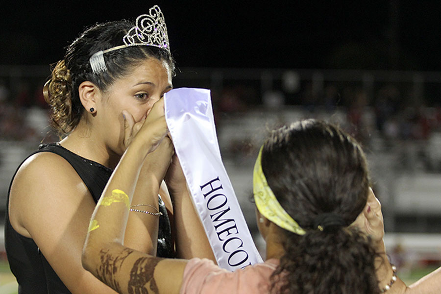 Rubi Rico and Devin Wickstrom rejoice after receiving their royalty.
