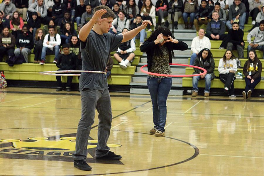 Senior Darryn Penry and junior Jocelyn Rebolledo battle in the final round of the hula hoop contest. Rebolledo outlasts Penry and takes the prize.  