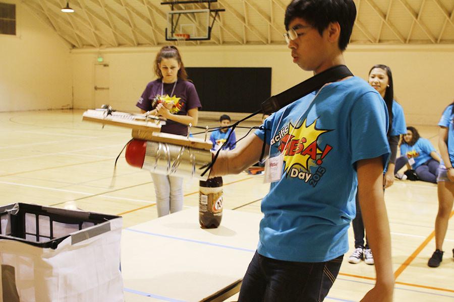 A student competing in the Prosthetic Arm Event.