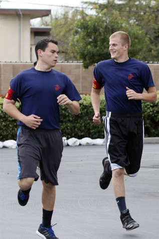 Senior Randy Brigance (right) attends physical training at the Marine Corps office twice a week. He is soon to be shipped off to basic training in South Carolina in August.