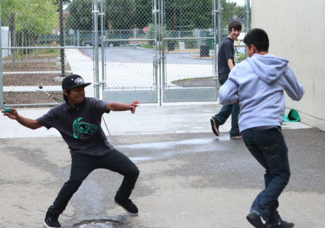 Students play a game  of ball tag at lunch.