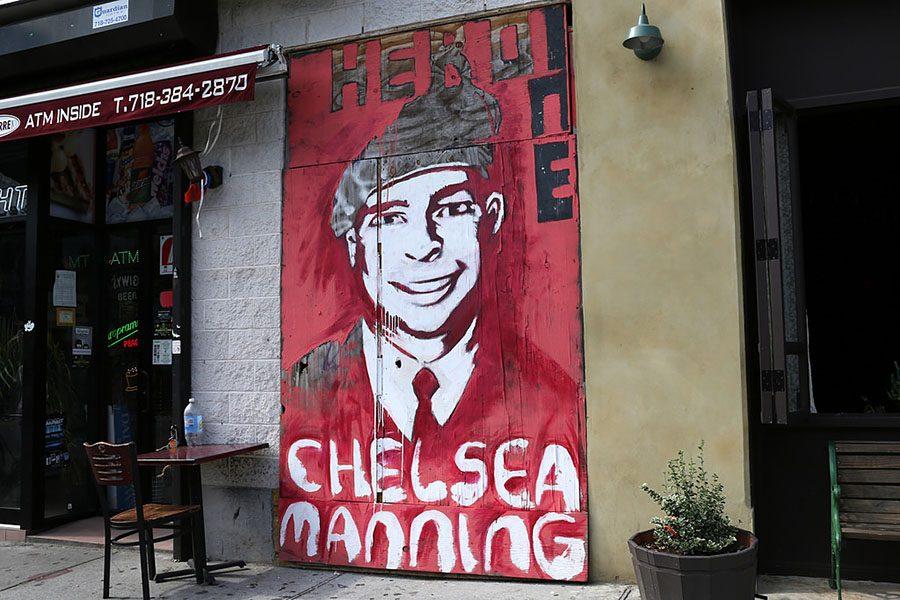 Sadly, this mural no longer exists, having been taken down (or covered over) by some newly-laid brickwork (quite similar to that in the picture to the left of the mural, behind the table). Chelsea Manning has been similarly removed-immured, locked away for years in the name of American justice.