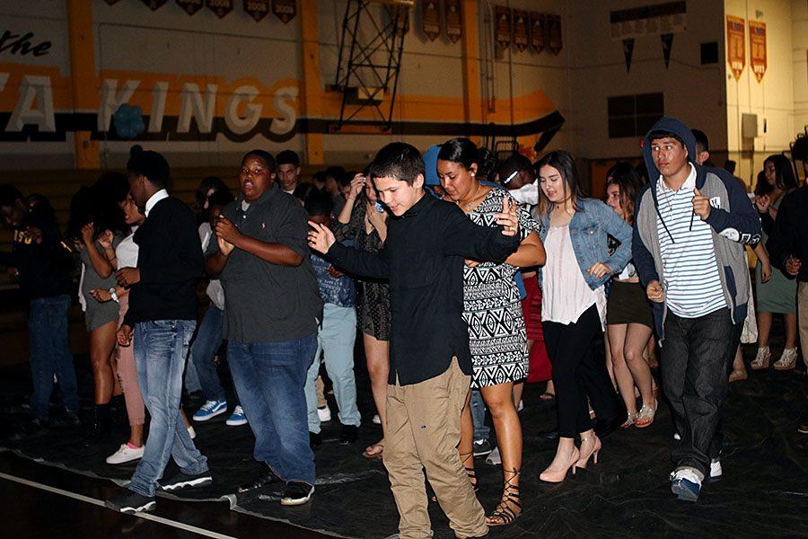 Rivera leads everyone in the Cha Cha Slide, during the spring fling dance. 