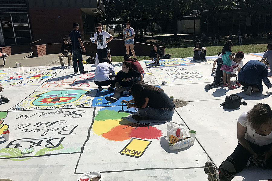 Seniors continue the tradition by painting the quad. 