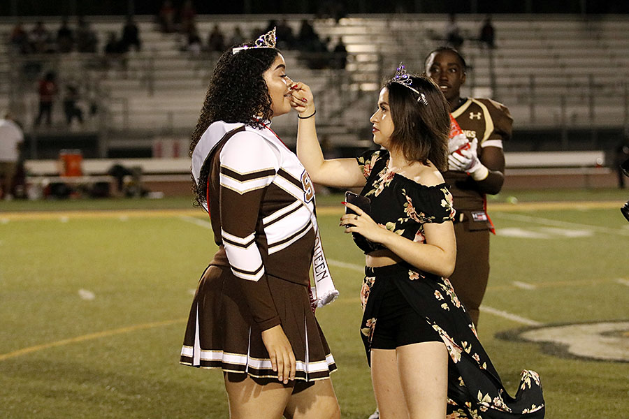 Perla Gonzales wipes Tressa Browns tears as she crowns her queen.