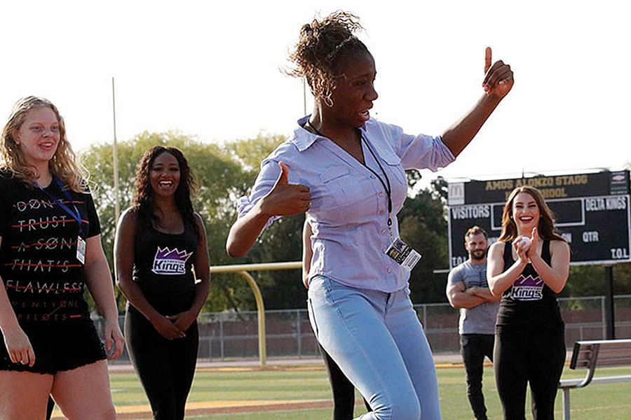 Freshman Josie Russell showcases her dancing skills even after participating in an exhausting push-up contest at the Back to School rally in dance competition held by the Stockton Kings.
