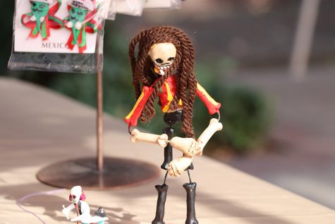Shops set up around the festival sell items Day of the Dead related, such as this little desk decoration 
