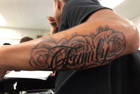 Junior Craig Barber, as a first tattoo, decided to get a symbol of significance, and also decides to add roses because of his mother. 