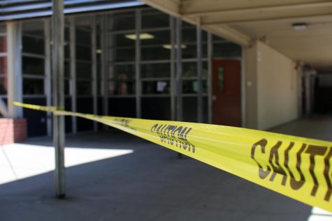 Caution tape to keep students from entering the now renovating cafeteria.