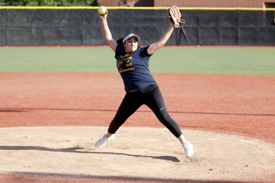 Junior Laurenne Dominguez practices pitching in preparation for an away game against Edison. The Delta Queens went on to win that game 7-6. 