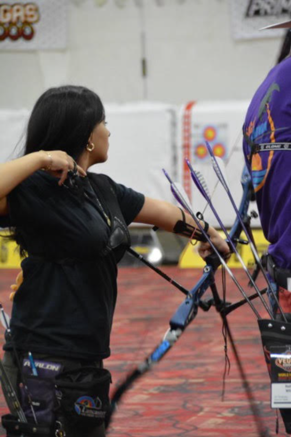 Cardnea practicing her archery skills,  2/3/23 at The Vegas Shoot.