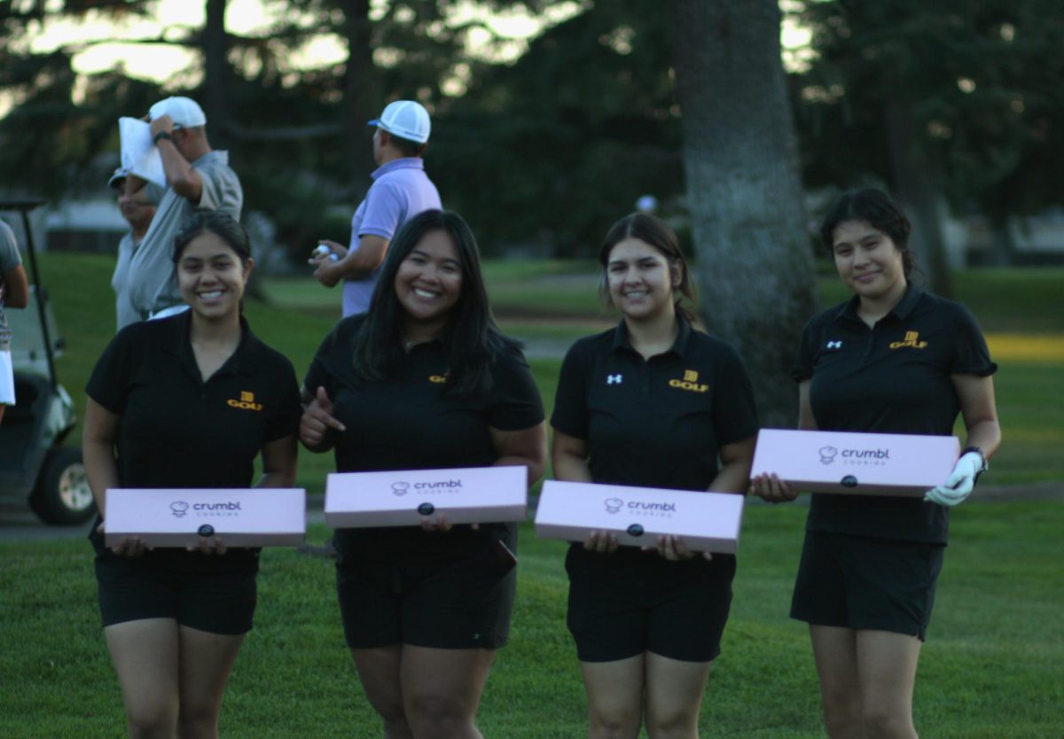 Mariam Keeler, Lady-Sophie, Aliana Echavarre, Kristen Riego posing with their senior night food. At Elkhorn Golf Course in Stockton, Calif., on Oct. 3, 2023. 