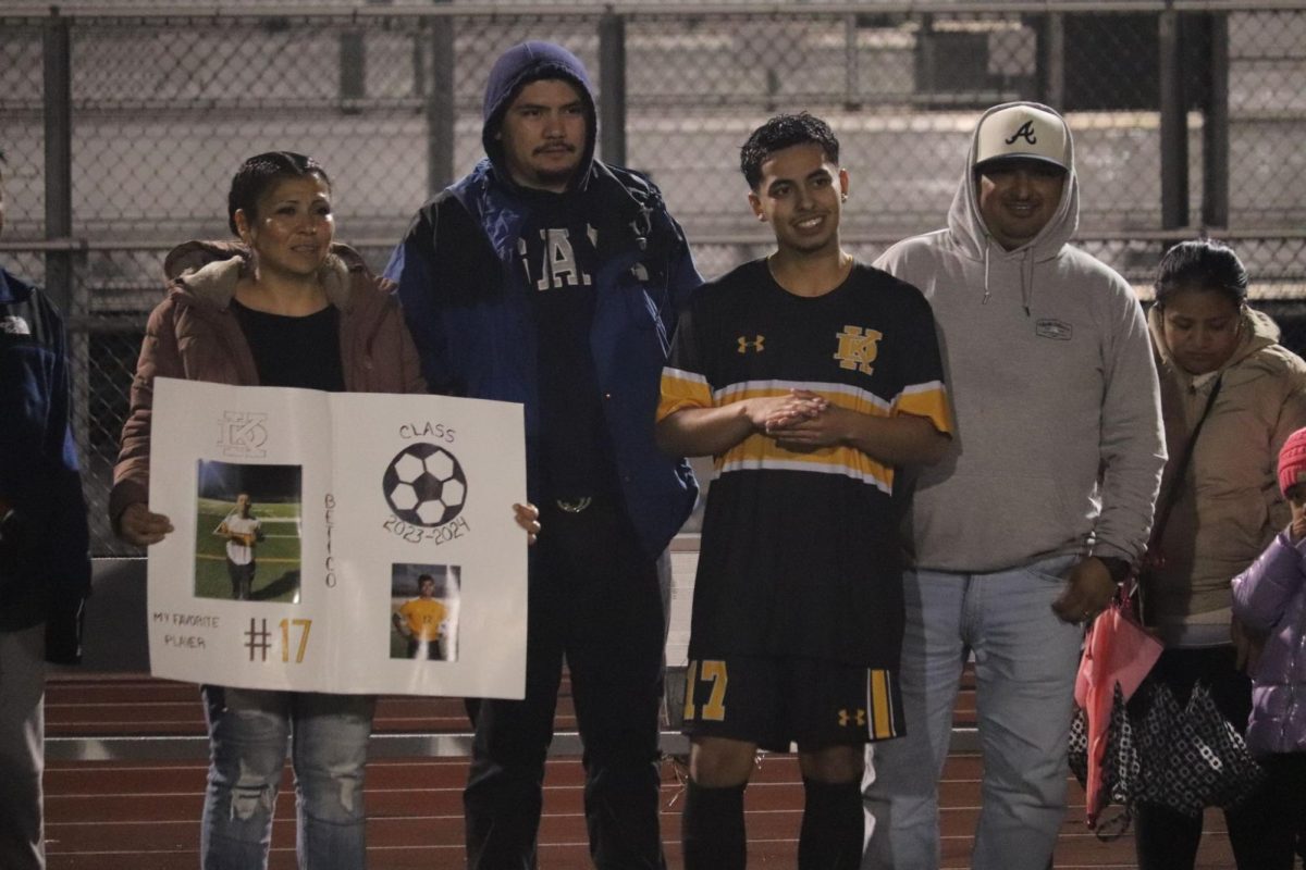 Roberto Florez poses for a picture with his parents and brother. Florez plays center back and has played for Stagg during his freshman, junior, and senior year. 
