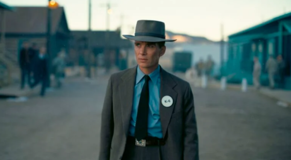 ©Boston.com.  J. Robert Oppenheimer (Played by Cillian Murphy) walking through the town built in Los Amos, New Mexico.