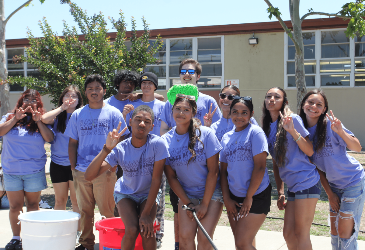 The class of 2025 pose with a smile before the Car Wash event on May 16. Class President, Adalina Pineda (not pictured) hopes to make the event an annual activity that will be passed down to the upcoming generations.