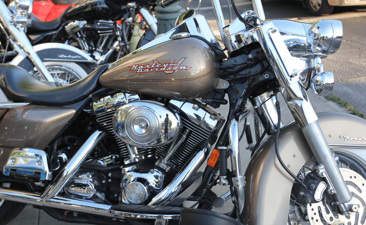A 2010 Harley Davidson bike parked on the sidewalk at the Miracle Mile Cruise. This is one of the few bikes to attend the event, and all the bikes stayed together the whole night.