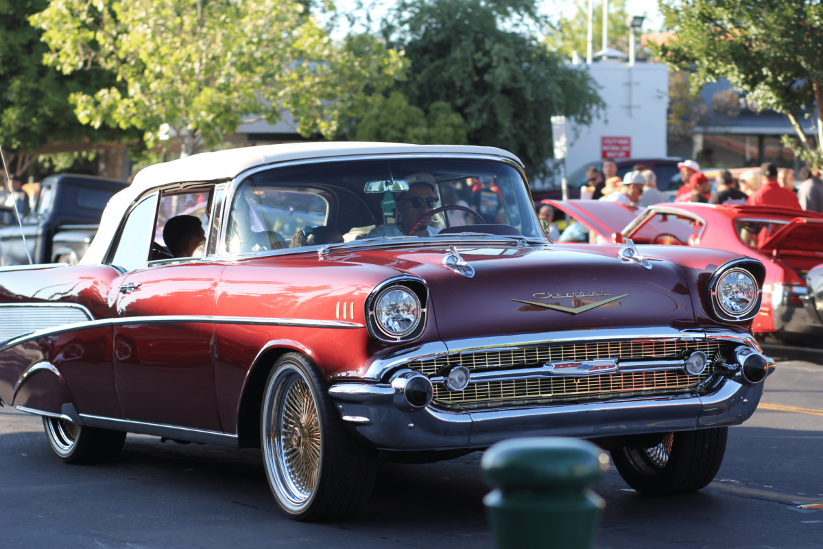 A 1957 Chevrolet Bel Air cruising through Miracle Mile during Cruise night. The Bel Air 2-door Nomad Wagon is the rarest model, with only 6,000 units made.