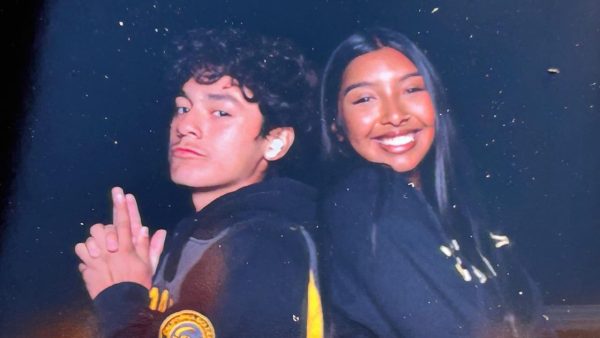 Pineda and Ramirez pose in a photo taken at the photobooth at Senior Sunrise. They were together throughout high school and attended the first senior event together.