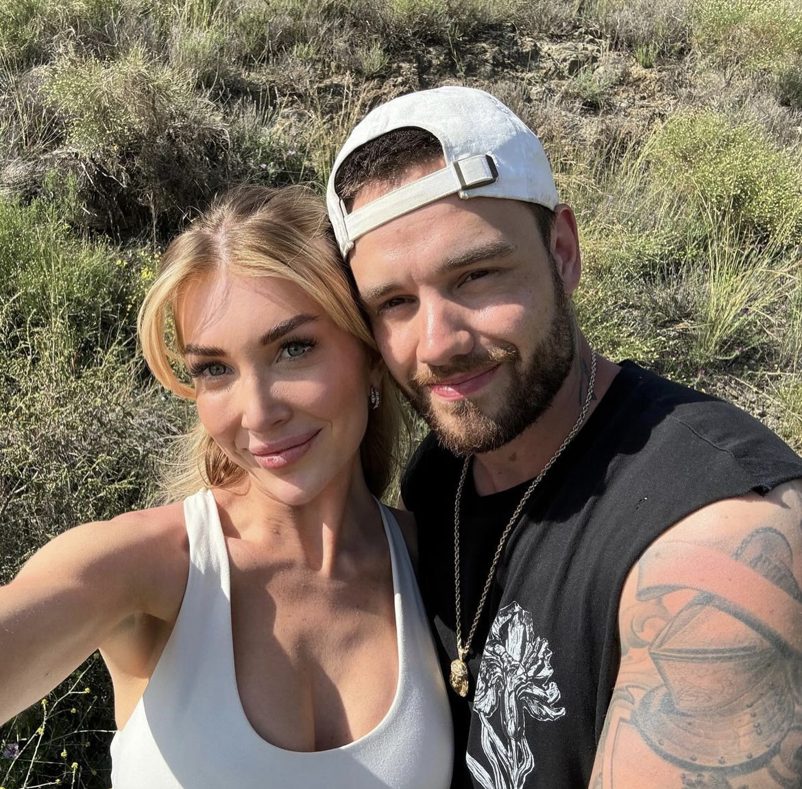 Liam Payne and his girlfriend Kate Cassidy on a hike while on vacation earlier this year. This picture was posted on Cassidy's Instagram on October 23, along with other photos of them together and a statement about his passing. (@kateecass)