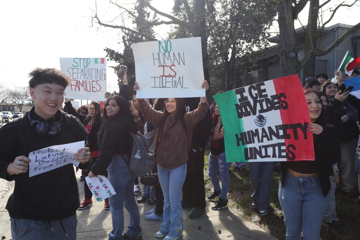 Stagg High School protesters stand together on Brookside Rd., holding up signs addressing the current deportation crisis.