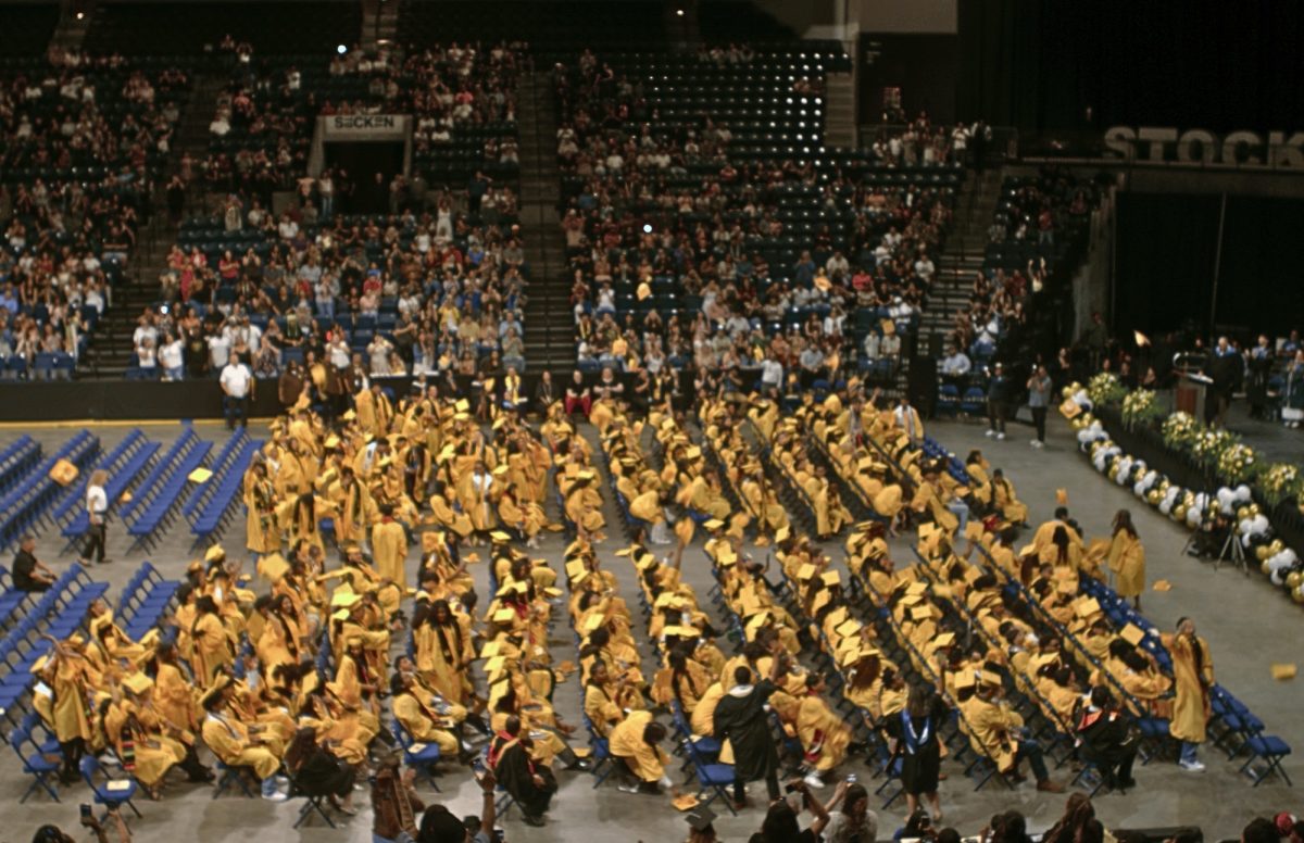 Towards the ending they turned their tassel then threw their caps into the air. All the seniors celebrate the end of a new chapter. 