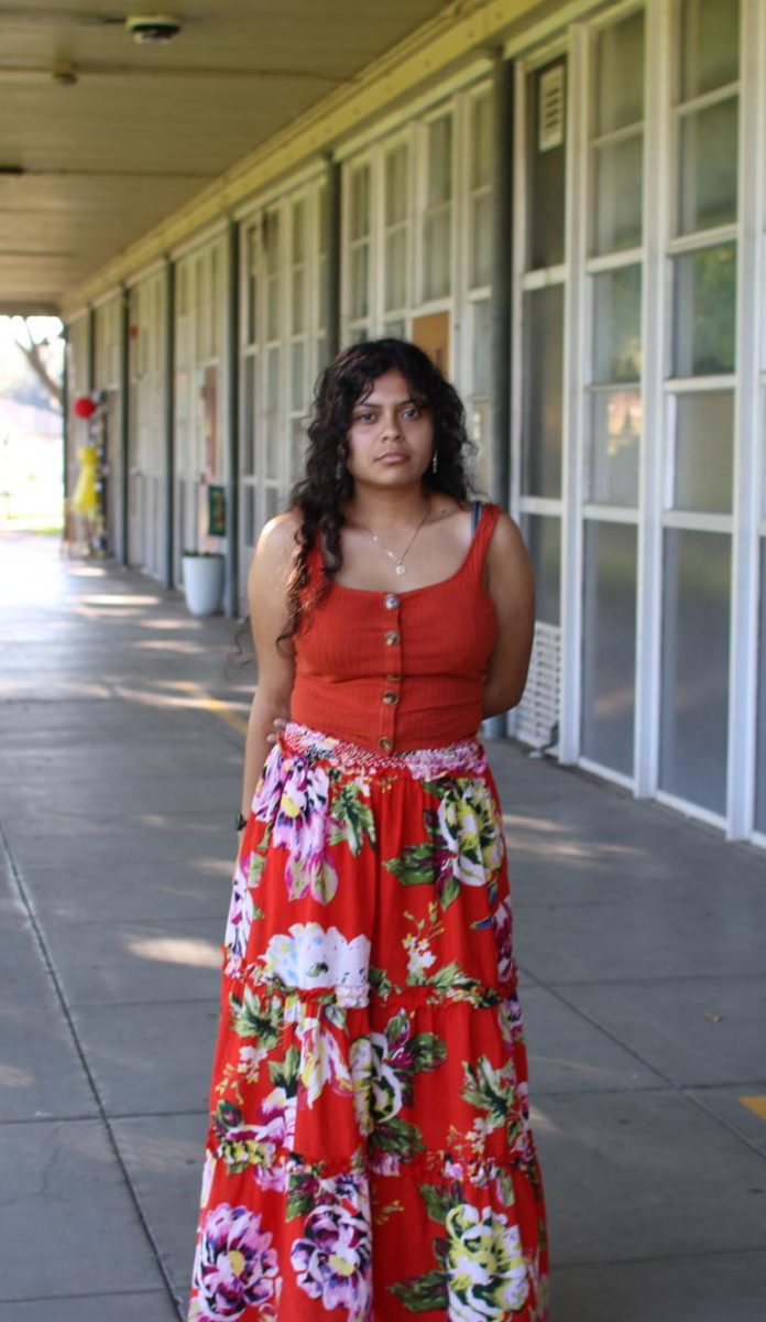 Rodriguez Baca with her orange outfit.
